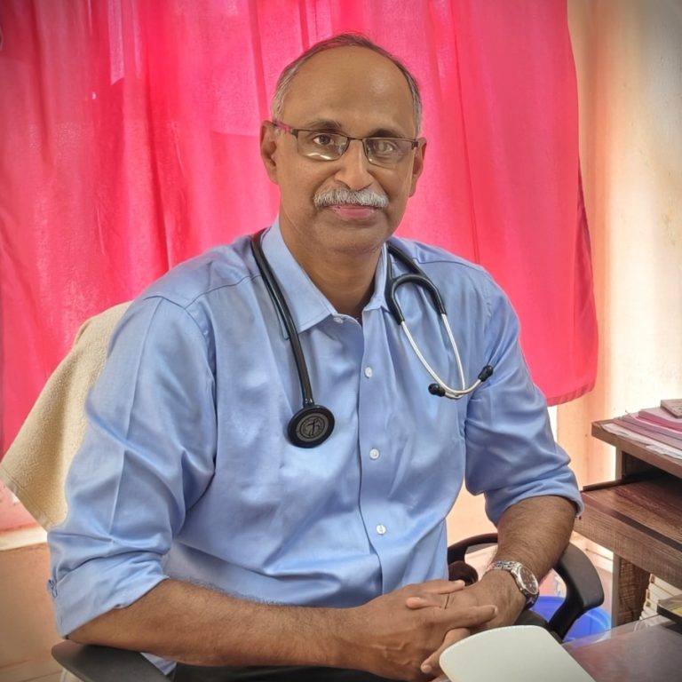 Dr. Cherian George