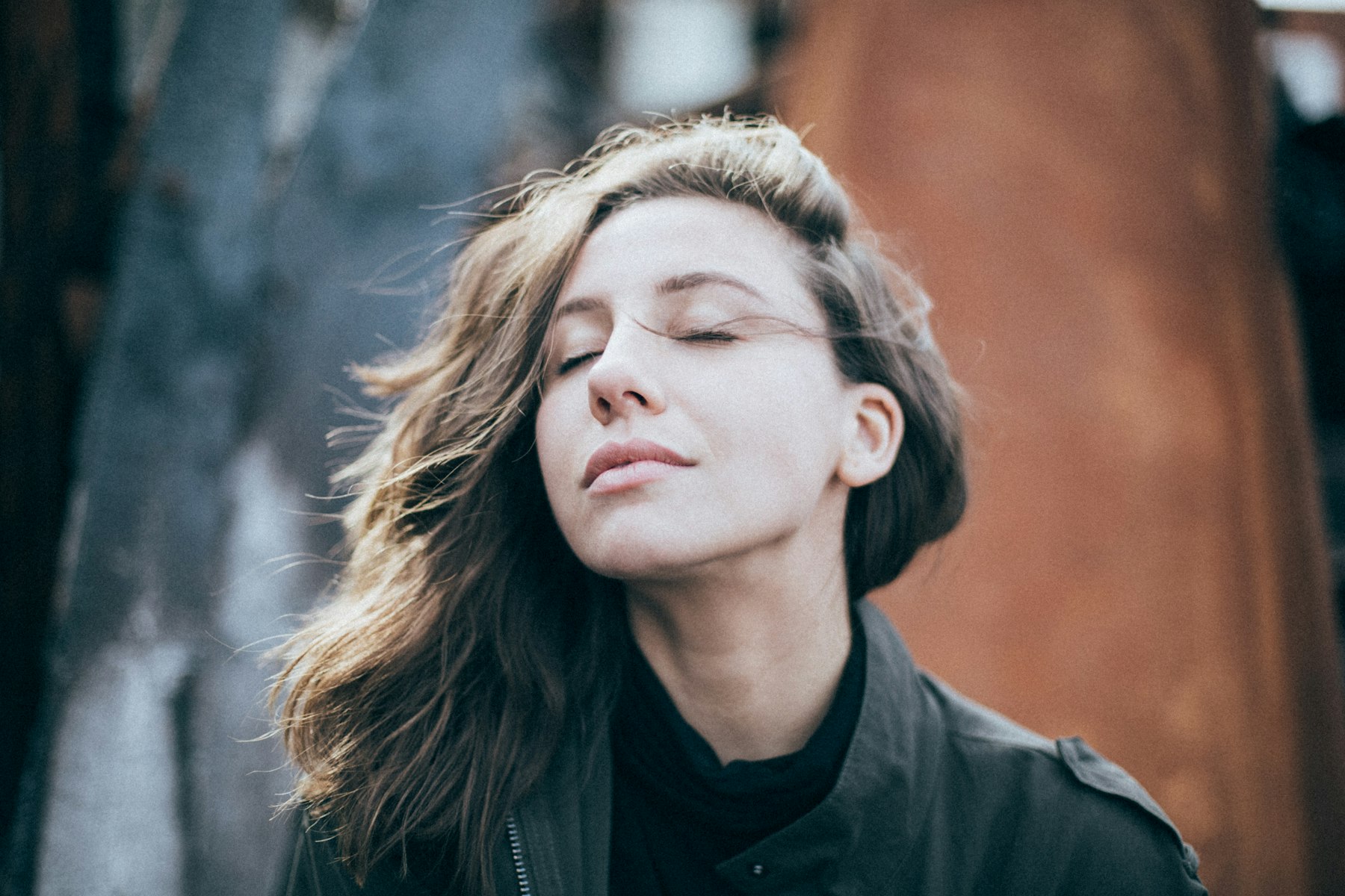 A person breathing deeply in a calm setting